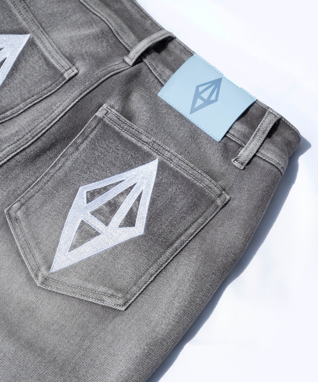 ODY FLARED JEANS - GREY